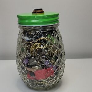 Glass Jar Filled With Earrings